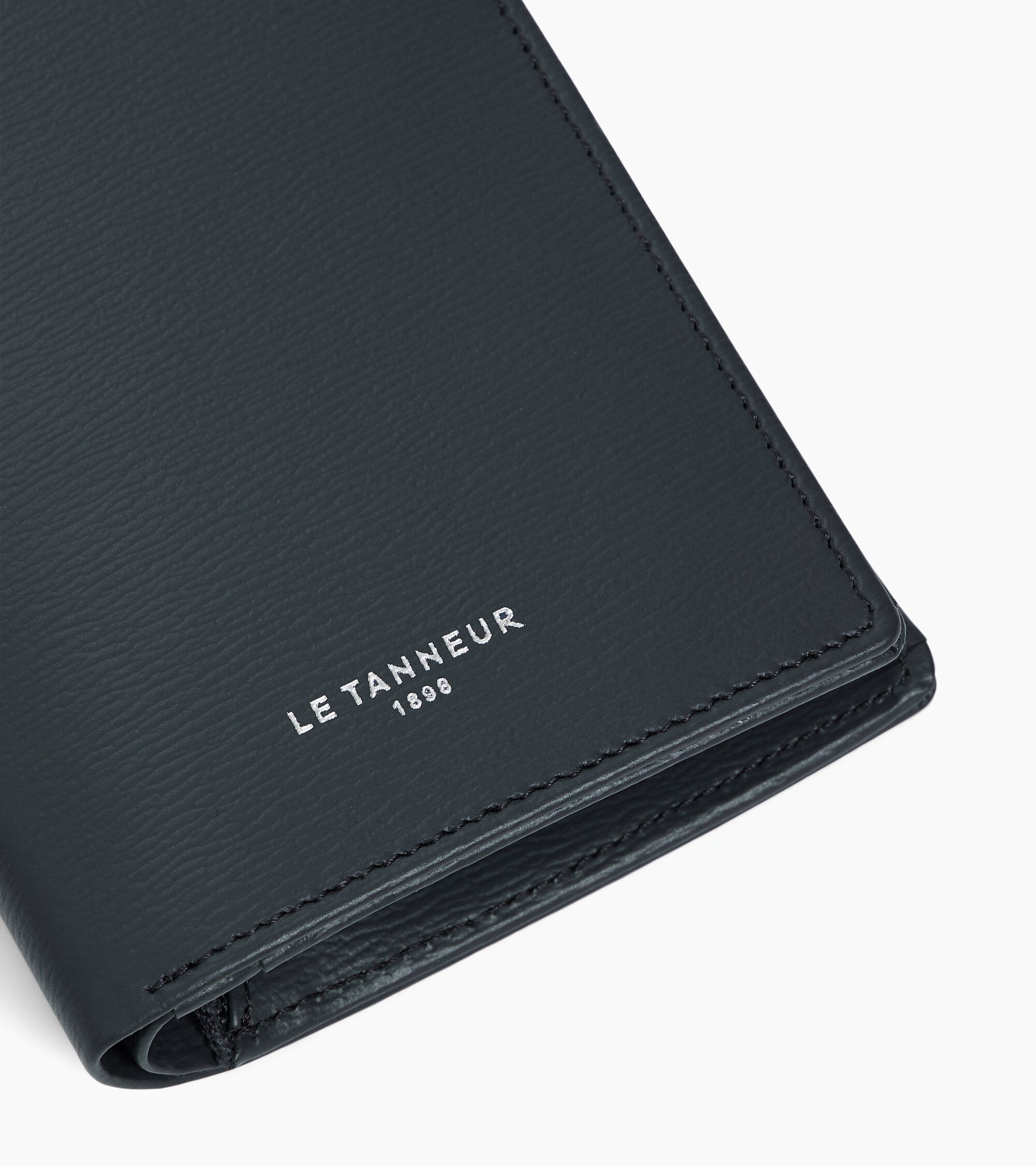 Lucien large vertical two-fold zipped wallet in bonded leather